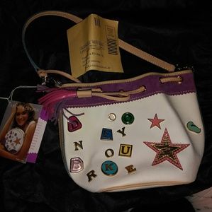 Brand new Dooney and Bourke mini draw string bag.